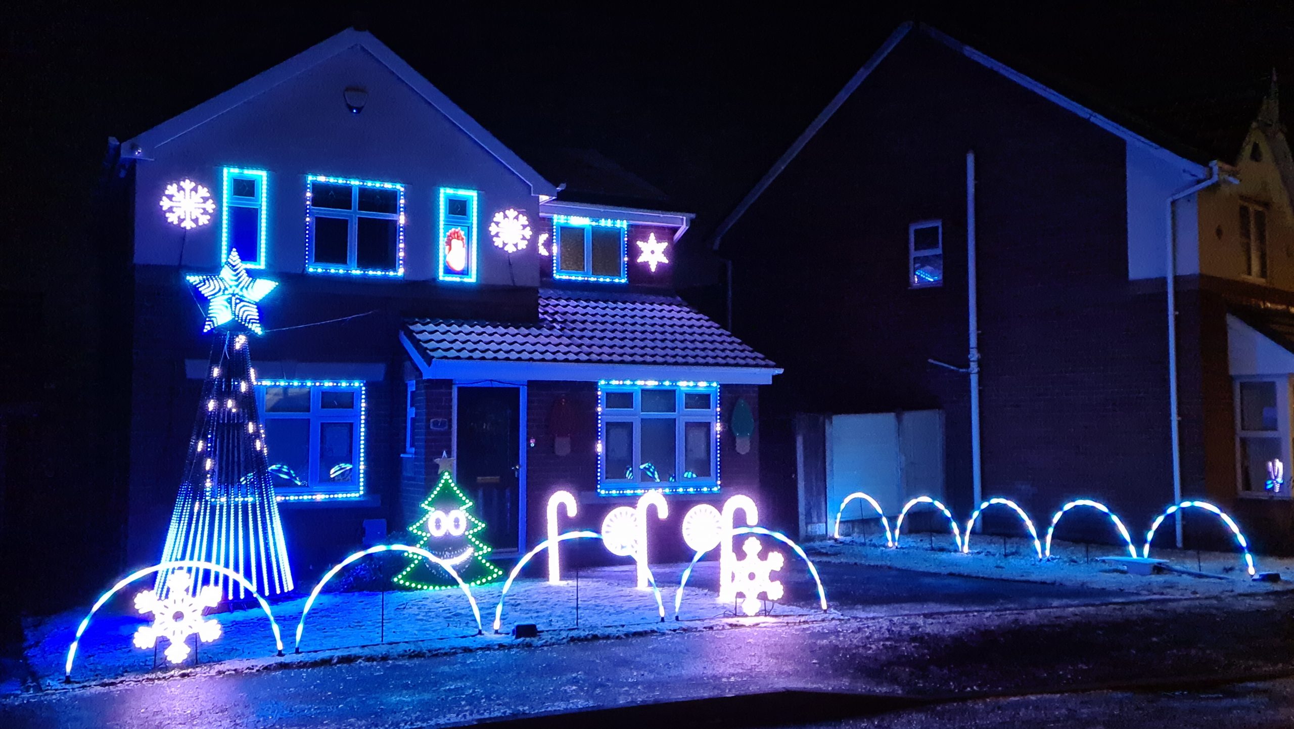 Liverpool couple decorate their house with over 20,000 Christmas lights to create dazzling